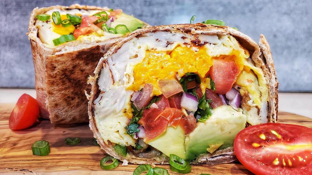 Turkey Breakfast Burrito · Smoked turkey, scrambled eggs, pico de gallo, avocado & cheddar cheese on a whole wheat wrap.