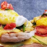 Florentine Benedict  · Poached eggs, spinach, English muffin, pico de gallo, hollandaise sauce, served with salad &...