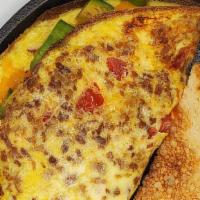 Turkey Club Omelette · Tomato, bacon, avocado & cheddar cheese.