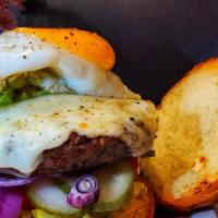 Bagutta Burger Deluxe  · 8oz angus beef served with smashed avocado, cheddar cheese, sunny side up egg, lettuce tomat...