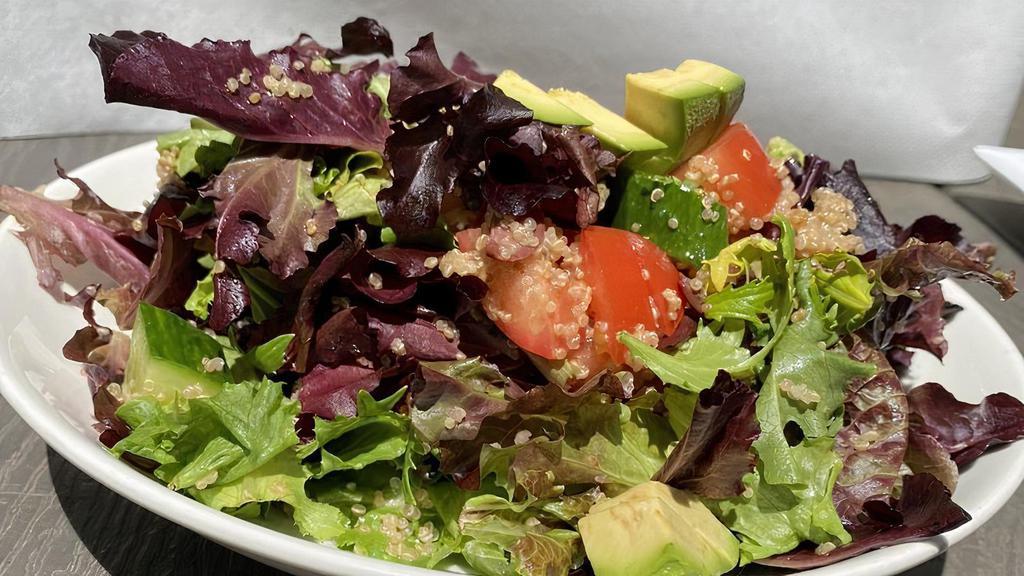 Quinoa Salad · Mixed greens, avocado, tomato, cucumber, Kalamata olives, and lemon dressing.