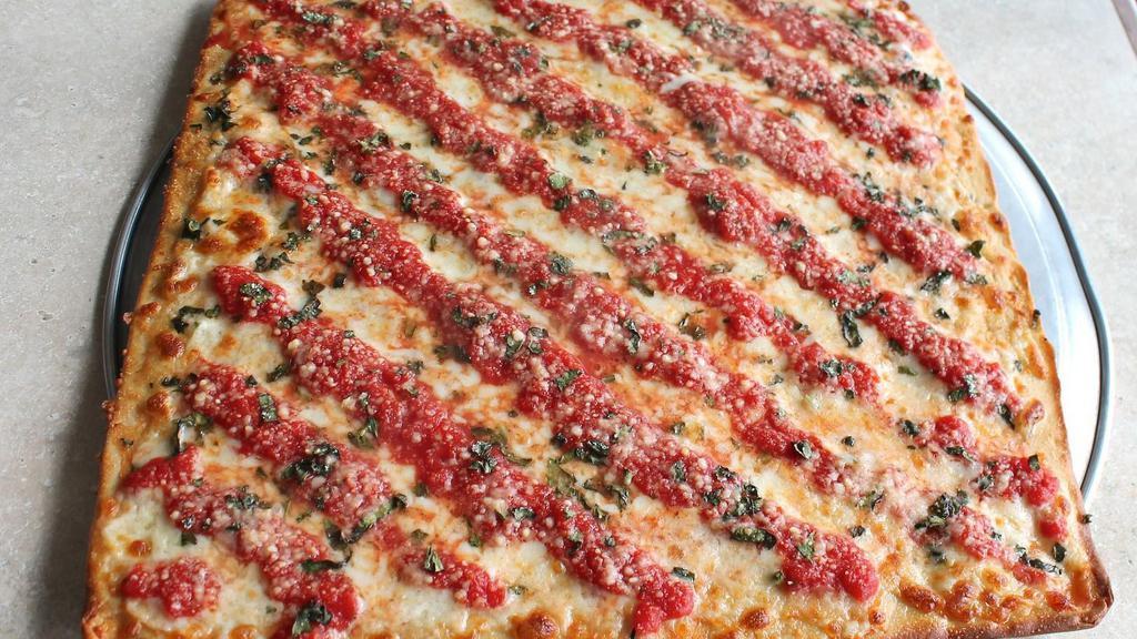 Grandma Pizza · Sicilian style crunchy thin crust with mozzarella cheese, sauce, garlic and basil.