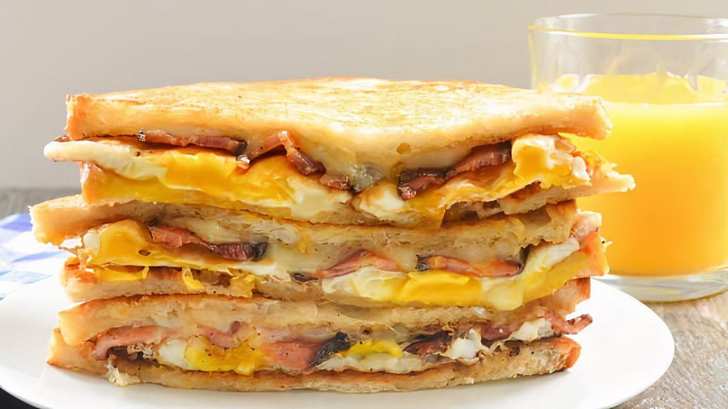 Bacon, Egg & Cheese Sandwich Breakfast · Bacon, turkey bacon or sausage with egg and cheese.