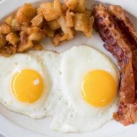 Bacon, Two Eggs & Home Fries Breakfast · Served with toast.