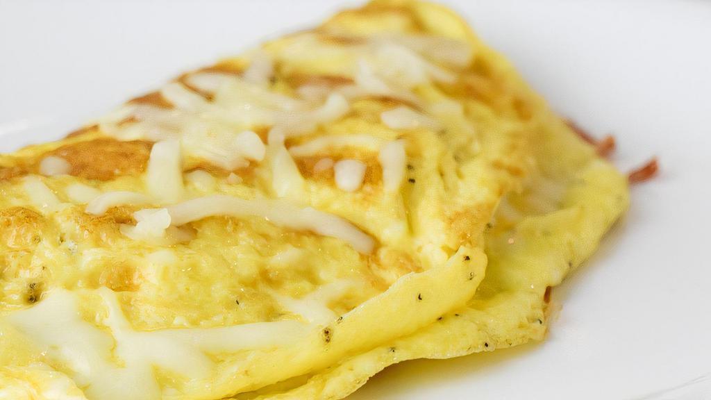 Cheese Omelette · Two kinds of cheese, onion, and peppers. Served with home fries and toast.