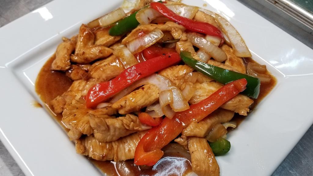 Chicken Teriyaki · Sauteed chicken strips with onions, red peppers and green peppers in a delicious teriyaki sauce.
