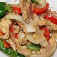 Sauteed Chicken Strips / Pechuga Salteada · Chicken breast sauteed with onions, red and green peppers.