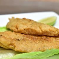 Fish Fillet (Swai) / Filete · A fresh water swai fish filet, lime cured and fried to its crispy perfection.