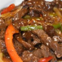 Beef Teriyaki / Res Teriyaki · Sauteed Sirloin beef strips with onions, red and green peppers in a delicious teriyaki sauce.