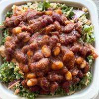 Southern Charm · Kale, Cilantro, Brown Rice, Tomato, Red Onion, Carrots, Topped with Bean Chili, Special Sauc...
