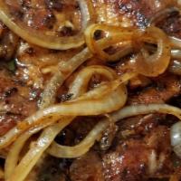 Pork Chop With Onion · Over Rice.