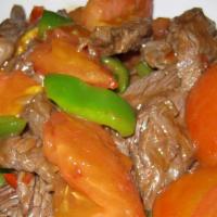 Beef With Fresh Tomato · Over Rice.