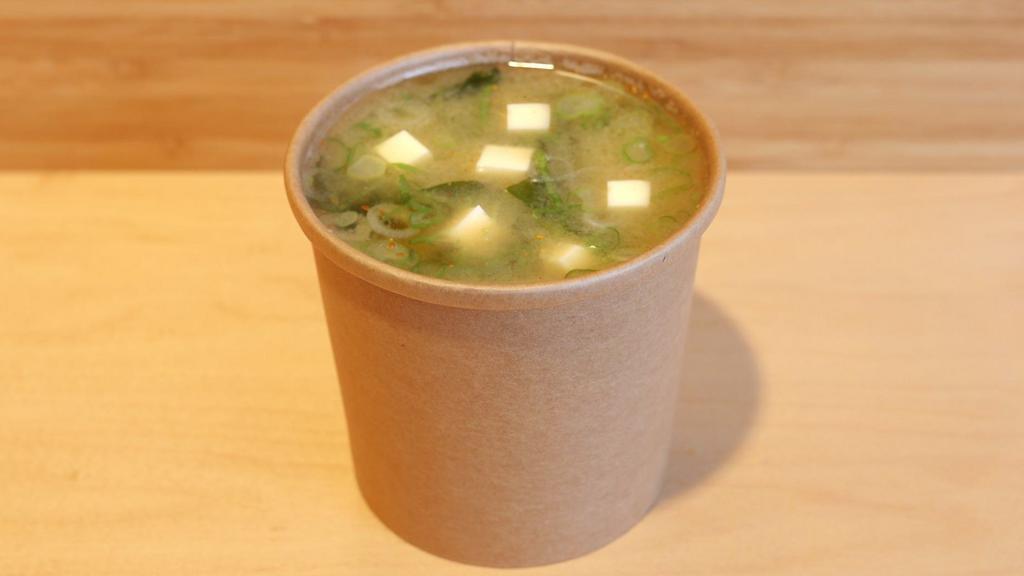 Housemade Miso Soup · Katsuo dashi, Shiro miso, silken tofu, wakame and negi.