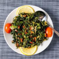 Spinach Sautéed · Sautéed spinach with tomatoes shallots and bell peppers.