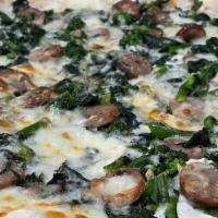 White Pizza With Sausage & Broccoli Rabe · Sausage, broccoli rabe, pecorino cheese and mozzarella.