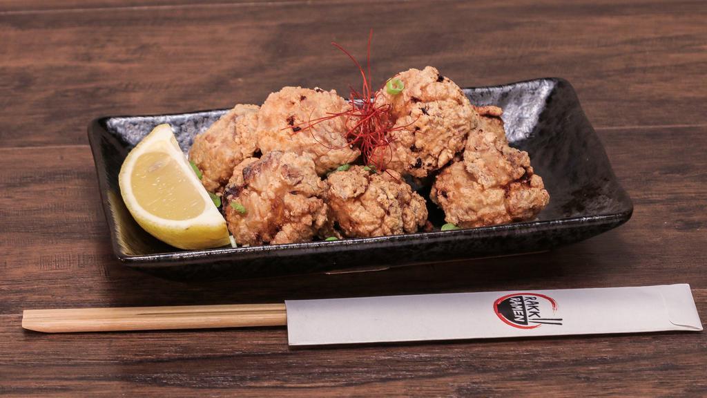 Karaage Chicken · Japanese style fried chicken served with a sweet and spicy chili sauce.