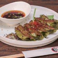 Fried Vegetable Gyoza · Served with infused soy dipping sauce.