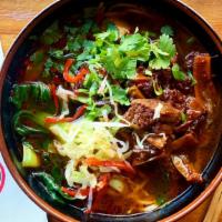 Osaka Beef Noodles · Beef and aromatic vegetable broth, stewed beef, scallions, bok choy and cabbage.