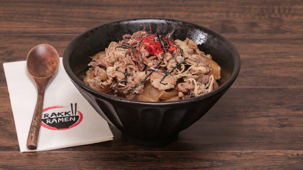 Sukiyaki Don · Marinated beef, caramelized onions, pickled ginger, and scallions. Served over white rice.