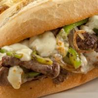 Philly Cheddar Cheese Steak · Juicy meat, creamy Cheddar cheese, and sauteed onions and green bell pepper served between a...