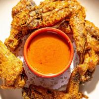 Voodoo Chicken With Crystal Hot Sauce · Dusted in a New Orlean's 'Voodoo Spice', served with crystal hot sauce (on the side) (6 full...