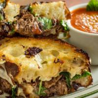 Braised Short-Rib Sandwich · Slow-cooked red-wine braised short rib, caramelized onions, arugula, gruyere cheese and blac...