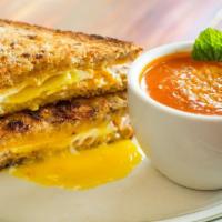 Morning Wood Sandwich · Thick cut maple-roasted applewood smoked bacon, fried egg and vermont aged cheddar cheese on...