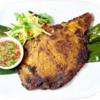 Classic Lemongrass Grilled Skate Fish 炭烧魔鬼鱼 · Spicy. Marinated with homemade turmeric lemongrass paste. Served with rice.