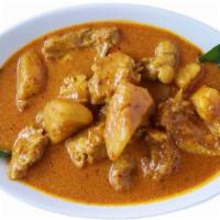 Curry Chicken With Potato 咖喱土豆鸡 · Spicy. Bone-in chicken cooked with cinnamon coconut curry. Served with rice.