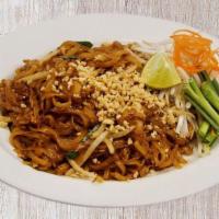 Pad Thai 北泰 · Spicy. Flat rice noodles, egg, tofu, bean sprouts, chives, crushed peanuts and lime wedge.