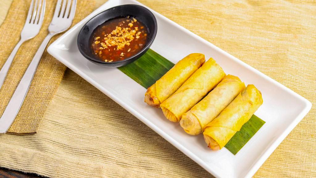 Por Pia (Crispy Roll) · Crispy rice paper filled with carrot, mushroom, vermicelli, ground pork and shrimp. Served with sweet and sour dipping sauce.