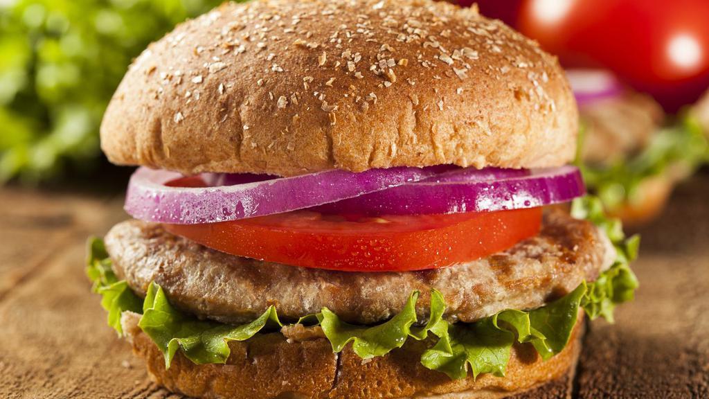 Turkey Burger · Juicy Turkey Burger with lettuce, tomatoes, and onions on our buttery buns.