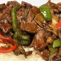Chopped Flank Steak Plate · This is 6 ounces of premium flat iron steak grilled with peppers onions and mushrooms served...
