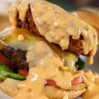 Ono Grindz Stuffed Burger · Deep-fried mac and cheese bacon stuffed burger.picture says it all cheese goodness in every ...