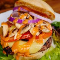 Ultimate Vegetarian Beyond Burger · Cheddar cheese, lettuce, tomato, grilled mushrooms and onions, and organic spring mix with o...