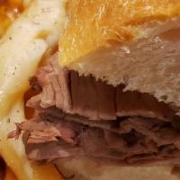 French Dip · Sliced roast beef on Italian bread, served with au jus.