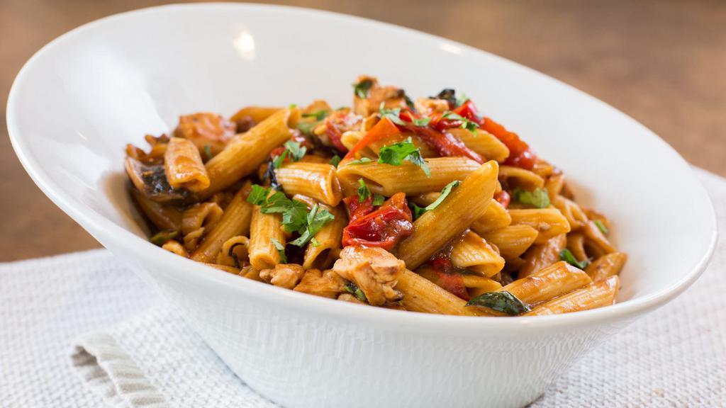 Penne Christina · Diced chicken breast with mushrooms, onions, red peppers, basil and penne pasta, tossed in a creamy marsala wine sauce.
