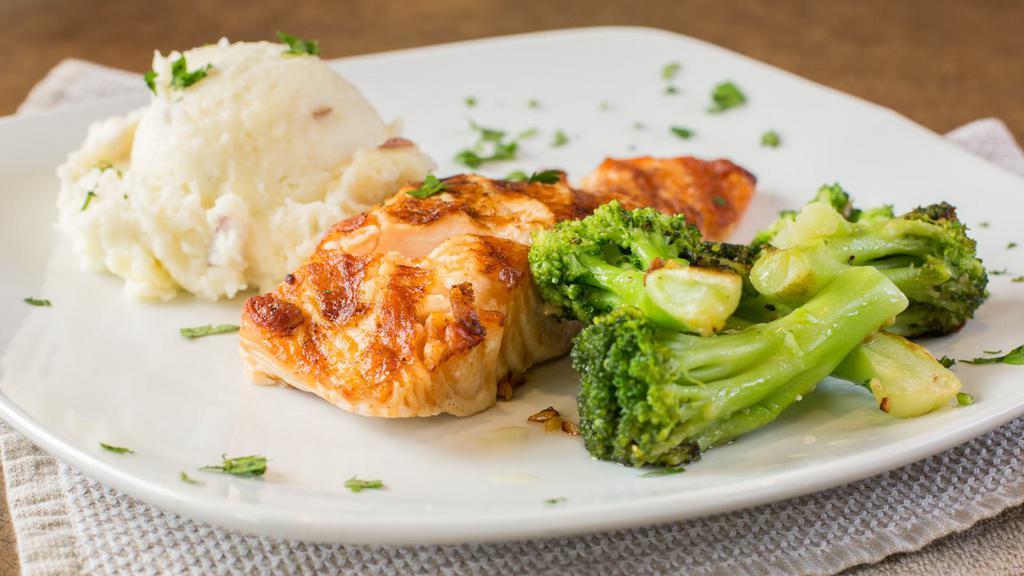 Oven Roasted Salmon · Salmon filet cooked to perfection, then drizzled with lemon and butter.