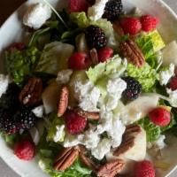 Winter Berry Salad · romaine, arugula, endive with pears, pecans, raspberries, blackberries, and goat cheese in a...