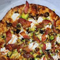 Honey Brussels Bacon · oven roasted Brussels sprouts + Aleppo pepper honey + bacon + ricotta