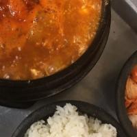 Organic Tofu & Kimchi Stew (“Sundubu-Jjigae”) · House-made Kimchi Stew with organic silken tofu, red kimchi, spicy seared pork, gochugaru (K...