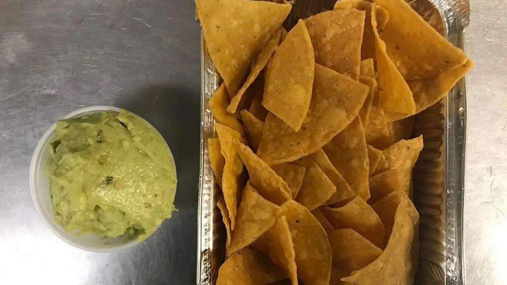 Chips & Guacamole · House-made chips and signature guac; two sizes - medium 4oz & large 8oz