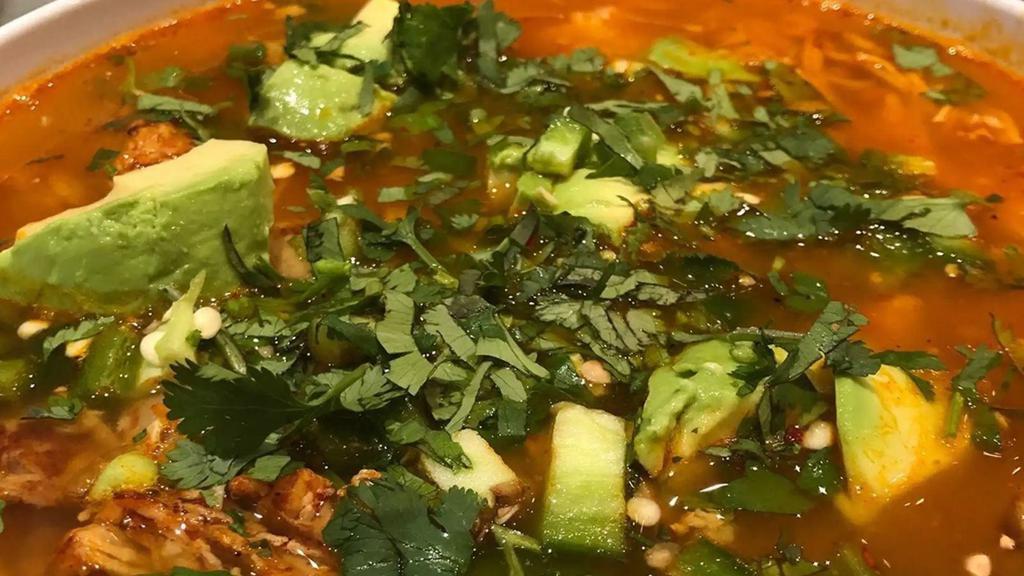 Mexican-Korean Chicken Soup · Chipotle chicken, fresh kimchi, avocado, jalapeño, cilantro.