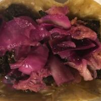 Korean Bbq Beef Short Rib Taco · Signature marinade, topped with red cabbage apple pear kimchi slaw.