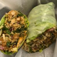 Ssam Burrito · Wrapped in RICE paper with green leaf lettuce, white rice, white kimchi, sesame leaf, finish...