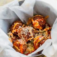 5 Piece Kimchi Arancini · (Crispy Rice Balls) kimchi fried rice combined with queso Oaxaca and Parmesan coated with pa...