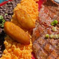 Grilled Steak · Sirloin steak. Yellow rice, beans and sweet plantains.