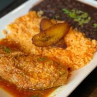 Roast Pork · Roast pork in beer, lime and garlic. Rice. Beans. Sweet Plantains.