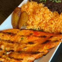 Grilled Lemon Chicken · Grilled cutlet. Yellow rice. Beans. Sweet plantains.