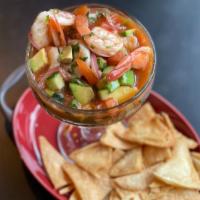 Mexican Shrimp Cocktail · Shrimp, avocado, cucumber, tomato and cilantro in mild spicy sauce. Tortillas Chips.